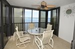 All-Weather Balcony enclosed with both screen and glass sliding doors.